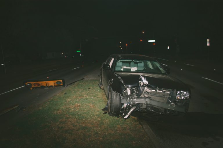 black vehicle on road