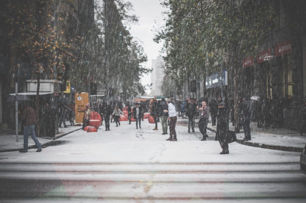 people walking on street during winter