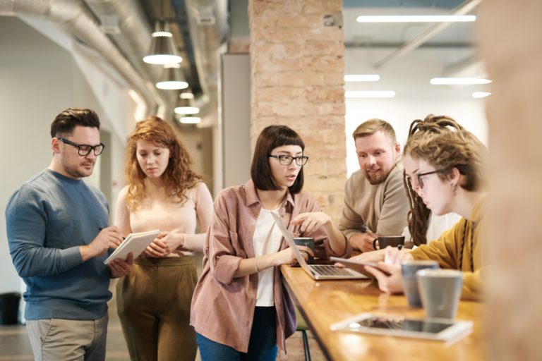 People in office discussing something